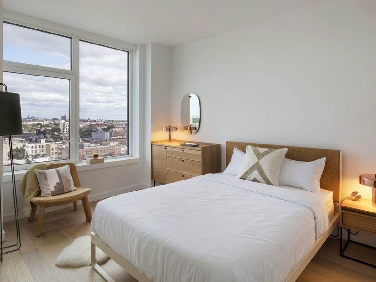 Bright bedroom with Brooklyn neighborhood views at 123 Linden Boulevard #17R